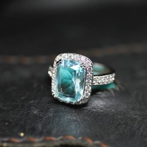Elegant Silver and Blue Gemstone Ring